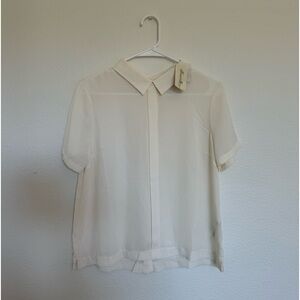 Forever 21 Cream back button down Blouse
Never worn/new with tag!